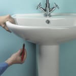 Fitting a basin and taps 12