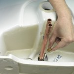 Fitting a basin and taps 5