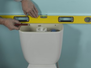 checking toilet cistern is level
