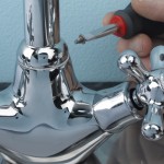 Fixing leaking kitchen taps 2